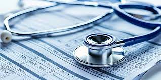 Dr. Prof. Dr. Mala Banik with patient